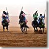A Berber horseman charge, called a fantasia, in Morocco.