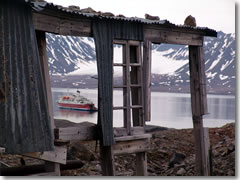 Shore excursions include visits to vanished whaling stations, weathered trapper's huts, and abandoned mining operations, a glimpse into the history and economy of one of humanity's most distant outposts.