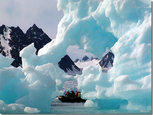 Zodiac tours on a Svalbard cruise zip around massive iceburgs to visit glaciers and make shore landings to take short hikes to examine the history, flora, and fauna of Spitsbergen, Svalbard, Arctic Norway