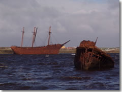 The waters of Stanley, capital of the Falkland Islands, is littered with the rusting hulks of 19th century ships.
