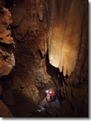 Philly Grotto member Naoko hauls herself up a slot in Pennsylvania's Corker Hill cave.