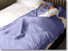 A silk sleep sack for staying in hostels and making rough, cheap sheets more comfortable