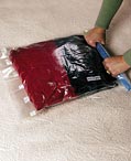 Compression bags for packing clothing