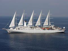 A masted cruise ship in the Bay of Naples off the Amalfi Coast gateway town of Sorrento.