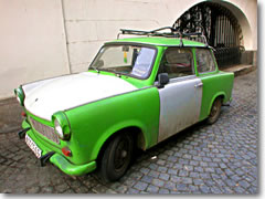 An East German Trabant parked on a cobblestone sidestreet in Prague