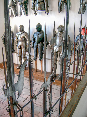 Swords, medieval weapons, and armor in the armory of the Burg Meersburg castle 