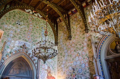 The complicated family tree of the Hohenzollern dynasty twists and tangles across the walls of the entry room to Hohenzollern Castle