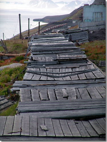 The pipes of Barentsburg, a Russian-Ukrainain mining town on the Grønfjord, have to be above-ground because of freezing tundra, and covered and insulated because of freezing winters on Spitsbergen, Svalbard, Arctic Norway