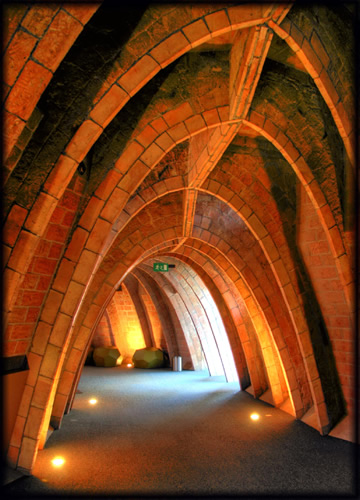 An arched corridor inside the Casa Mil, Barcelona