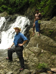 Reid Bramblett and Olmedo the Embera at a waterfall in the Panamanian jungle of Chagres National Park.