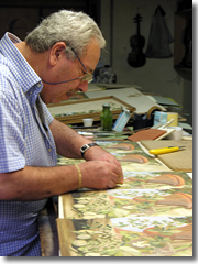 Giuseppe Rocco works on his intarsia marquetery.