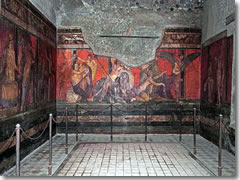 Some frescoed chambers—like this one at the Villa dei Misteri—survived the ages intact.