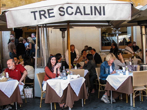 The cafe tables of Tre Scalini on Piazza Navona in Rome