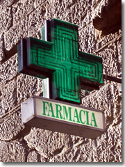 A farmacia (pharmacy or chemists) in Italy is always marked by a glowing green cross sign.