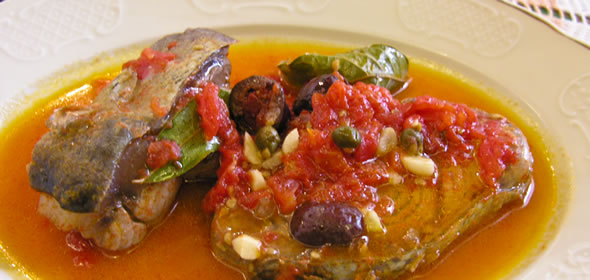 Tuna steak with tomatoes, capers, and olives at La Foglia