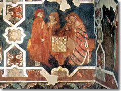 A medeival fresco of nobles playing chess in the Castello di Arco
